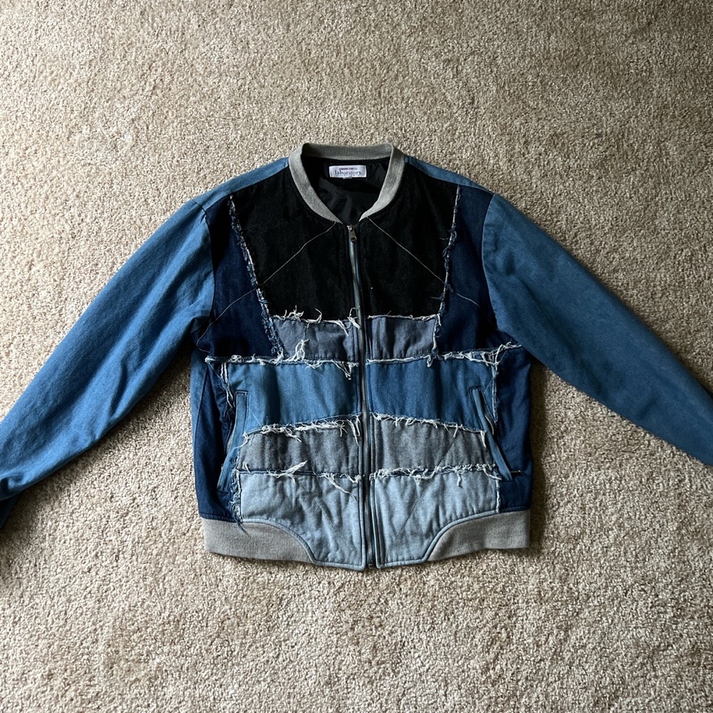Unique multi patch denim bomber jacket with fringe detailing